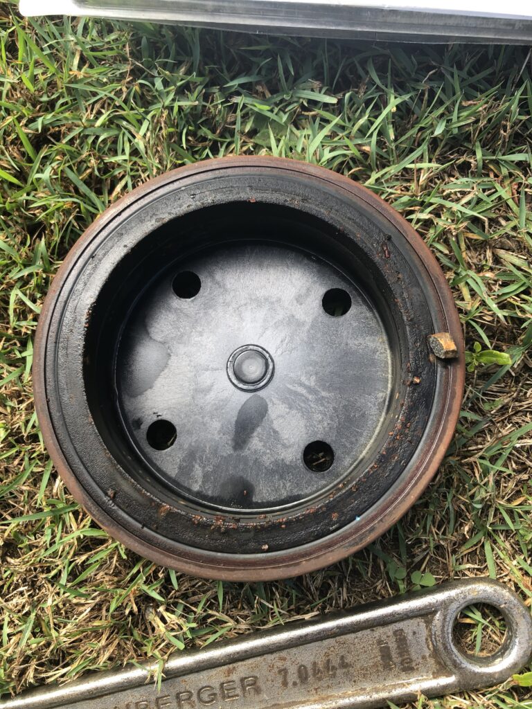 The bottom half of a wilkins RP375 that has been damaged by dirt