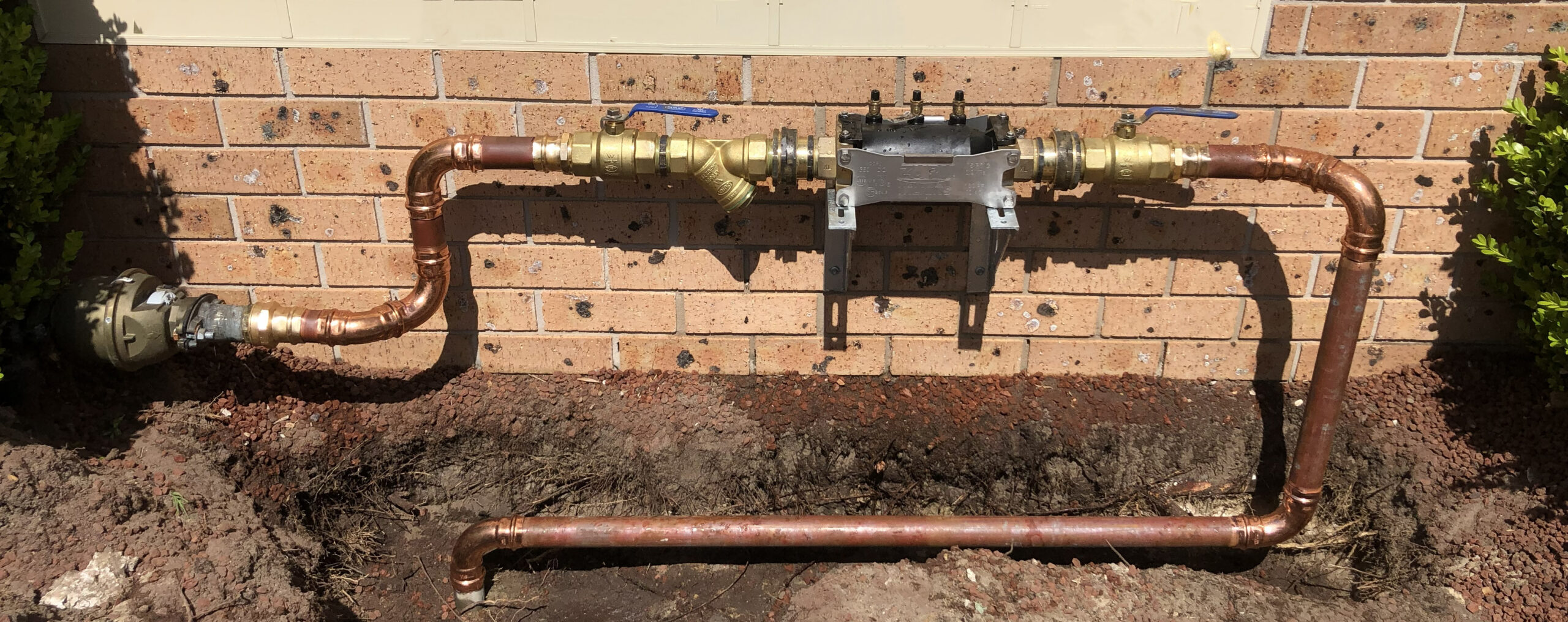 new wilkins 375 RPZD installed with pipework exposed in the ground