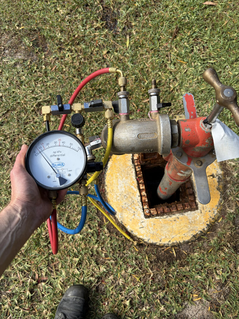 a backflow testing being carried out on  a standpipe with 7kpa differential